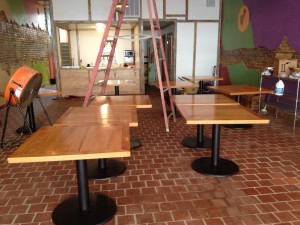 Tables delivered and attached to metal bases